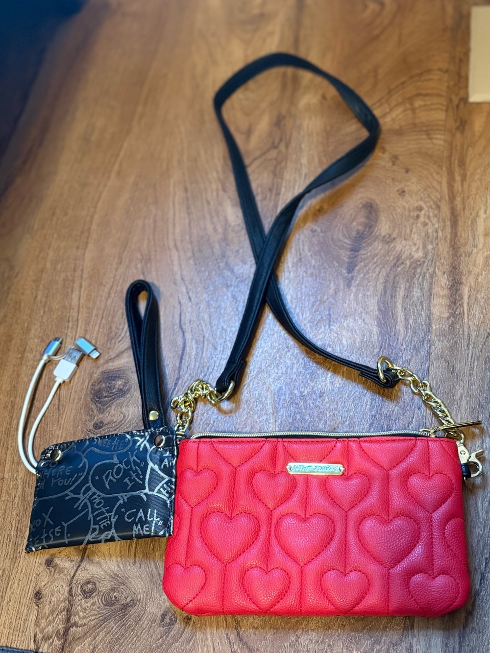 Betsey Johnson Red Quilted Heart Crossbody/wristlet with portable charger.  EUC